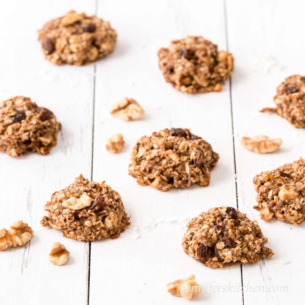 Sugar-Free Banana Breakfast Cookies on a white background with walnut pieces.