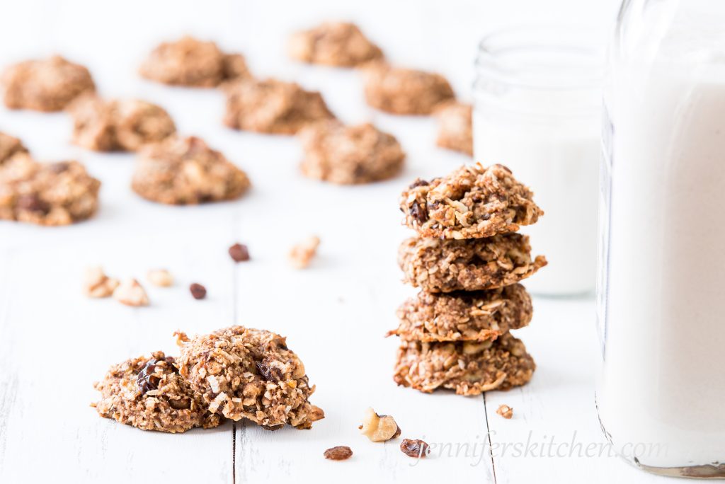 Stack of Sugar-Free Banana Date Bites with non-dairy milk on the side.