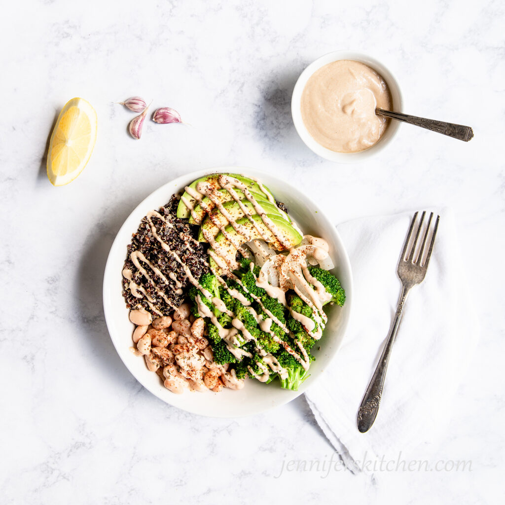 Broccoli Bowl with Tahini Sauce and fresh lemon on the side