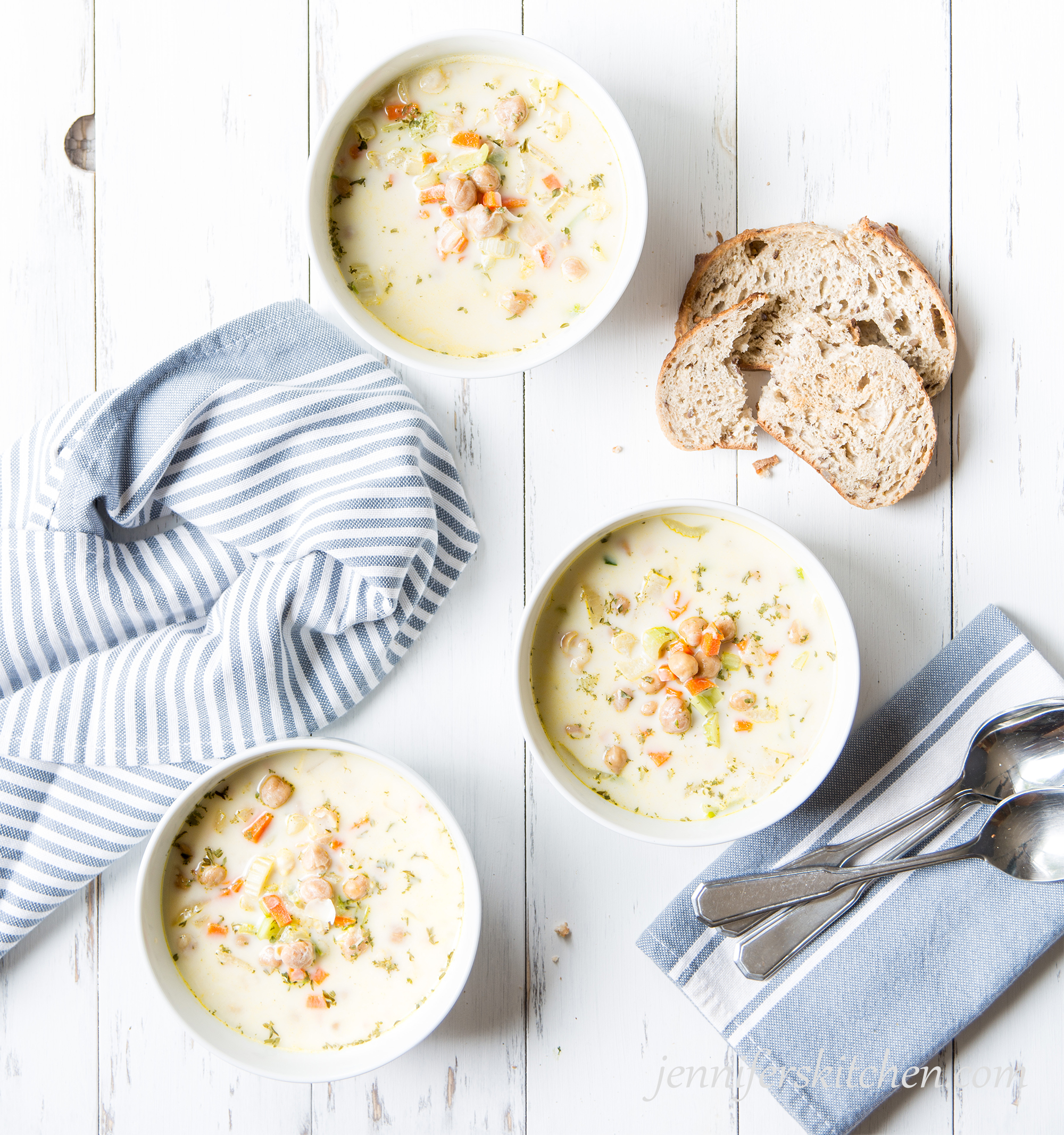 Creamy Chickpea Soup in bowls with crusty bread