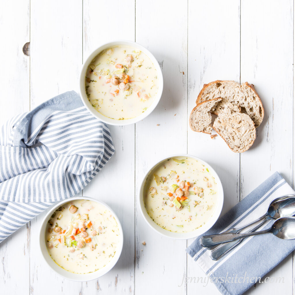 Creamy Chickpea Soup in bowls with crusty bread