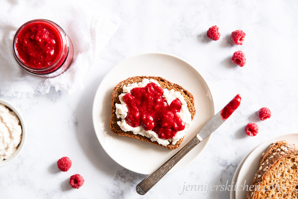 Sugar-Free Raspberry Jam on toast with almond cheese.